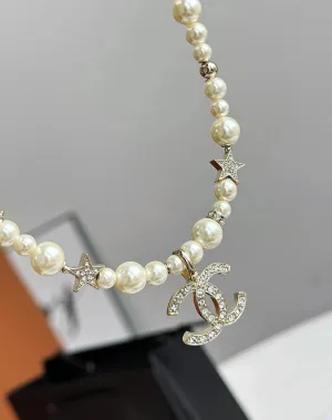 New pearl and diamond logo necklace