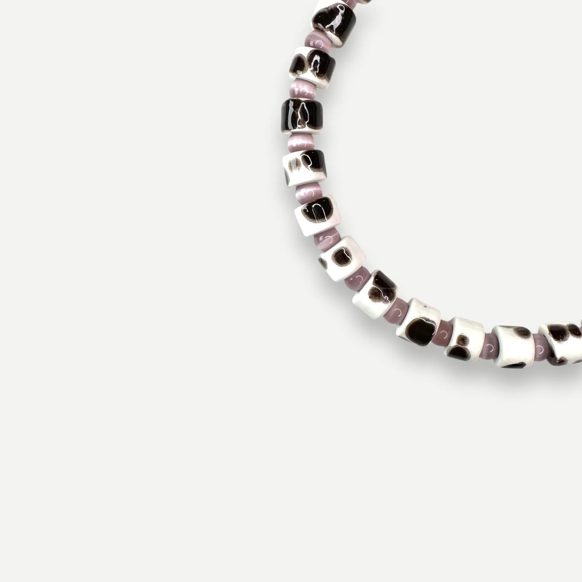 TORT & CAT EYE SUNDRY.  BEAD TWO.