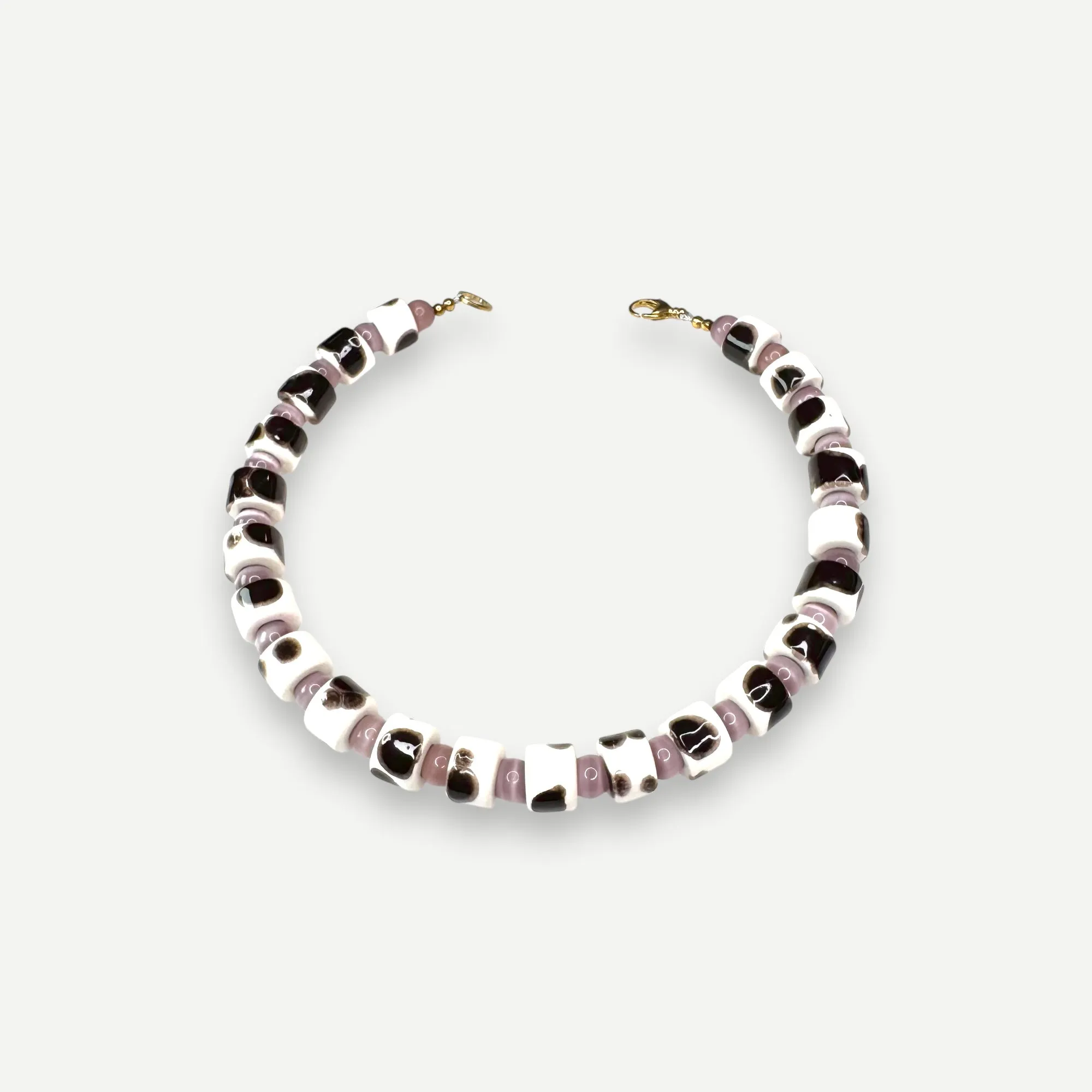 TORT & CAT EYE SUNDRY.  BEAD TWO.